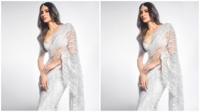 Assisted by celebrity fashion stylist Maneka Harisinghani, Mouni completed her glam look with a silver mang tika and several diamond rings adorning her fingers. (Instagram/@imouniroy) Assisted by celebrity fashion stylist Maneka Harisinghani, Mouni completed her glam look with a silver mang tika and several diamond rings adorning her fingers. (Instagram/@imouniroy)