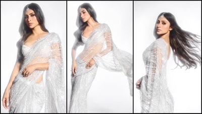 Mouni Roy is here to show you how to rock a silver saree like a pro with her latest pictures wearing a mesmerising net saree. The actress is a total stunner who can pull off any look to perfection. Whether it's a casual mini dress or a chic pantsuit. Mouni knows how to turn heads. And her latest look, donning six yards of grace, is no exception and is sure to inspire your festive wardrobe. Her followers are swooning, while we cannot take our eyes off the diva. Scroll down to take some style notes. (Instagram/@imouniroy) Mouni Roy is here to show you how to rock a silver saree like a pro with her latest pictures wearing a mesmerising net saree. The actress is a total stunner who can pull off any look to perfection. Whether it's a casual mini dress or a chic pantsuit. Mouni knows how to turn heads. And her latest look, donning six yards of grace, is no exception and is sure to inspire your festive wardrobe. Her followers are swooning, while we cannot take our eyes off the diva. Scroll down to take some style notes. (Instagram/@imouniroy)