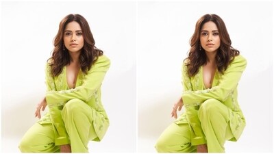 Nushrratt looked stunning as ever in a green embellished bralette, a matching blazer with full sleeves and embellishment details. She teamed it with a pair of matching formal trousers. (Instagram/@nushrrattbharuccha) Nushrratt looked stunning as ever in a green embellished bralette, a matching blazer with full sleeves and embellishment details. She teamed it with a pair of matching formal trousers. (Instagram/@nushrrattbharuccha)