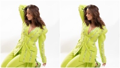 Nushrratt played muse to fashion designer Prreeti Jaiin Nainutia and picked a soft green sequined pant suit from the shelves of the designer. (Instagram/@nushrrattbharuccha) Nushrratt played muse to fashion designer Prreeti Jaiin Nainutia and picked a soft green sequined pant suit from the shelves of the designer. (Instagram/@nushrrattbharuccha)
