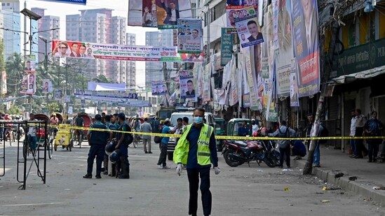 Bangladesh Protests: Bangladesh's Criminal Investigation Department (CID) member inspects a protest site after Bangladesh Nationalist party (BNP) activists held a rally. (AFP)
