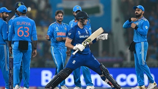 Indian players celebrate after the dismissal of Liam Livingstone during the 2023 ICC Men's Cricket World Cup match between India and England(AFP)