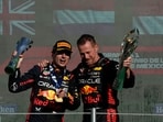 Red Bull driver Max Verstappen of the Netherlands, left, and engineer Richard Wolverson celebrate on the podium