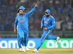 India's Kuldeep Yadav (L) celebrates with teammates after taking the wicket of England's captain Jos Buttler. India's Kuldeep Yadav (L) celebrates with teammates after taking the wicket of England's captain Jos Buttler.