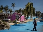 A man walks past at a damaged area in the aftermath of Hurricane Otis in Acapulco, Mexico on October 29. A man walks past at a damaged area in the aftermath of Hurricane Otis in Acapulco, Mexico on October 29.