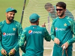 Pakistan's captain Babar Azam with teammates Haris Rauf and Shaheen Afridi during a practice session. Pakistan's captain Babar Azam with teammates Haris Rauf and Shaheen Afridi during a practice session.