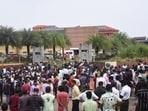 People gather after an explosion that killed a woman and injured several others, at a convention centre in Kochi (PTI) People gather after an explosion that killed a woman and injured several others, at a convention centre in Kochi (PTI)