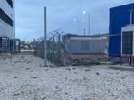 A damaged fence at the airport in Makhachkala. Russian police.