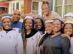 Lawrence siblings posing with their parents. Lawrence siblings posing with their parents.