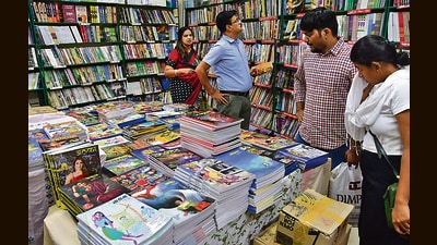 A customer browsing through a Diwali ank at Majestic Book store in Dadar. (Bhushan Koyande/HT Photo)