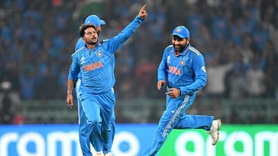 India's Kuldeep Yadav (L) celebrates with teammates after taking the wicket of England's captain Jos Buttler. (AFP) India's Kuldeep Yadav (L) celebrates with teammates after taking the wicket of England's captain Jos Buttler. (AFP)