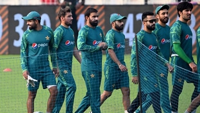Pakistan's captain Babar Azam (L) attends a practice session at the Eden Gardens in Kolkata. (AFP) Pakistan's captain Babar Azam (L) attends a practice session at the Eden Gardens in Kolkata. (AFP)