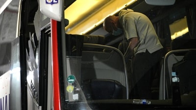 Police take finger prints in a bus that the Lyon soccer team were traveling in, before arriving at the Velodrome Stadium (AP) Police take finger prints in a bus that the Lyon soccer team were traveling in, before arriving at the Velodrome Stadium (AP)