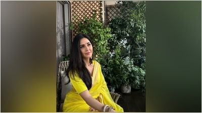 Katrina's yellow tissue silk saree is from the shelves of the label Raw Mango. It features gold patti borders and minimal brocade embroidery. The actor wore the six yards traditionally, with pleats on the front and the pallu falling from her shoulder elegantly. (Instagram) Katrina's yellow tissue silk saree is from the shelves of the label Raw Mango. It features gold patti borders and minimal brocade embroidery. The actor wore the six yards traditionally, with pleats on the front and the pallu falling from her shoulder elegantly. (Instagram)