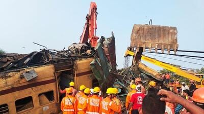 Members of the National Disaster Response Force conduct rescue operation at the site of train crash in Vizianagaram district (AFP) Members of the National Disaster Response Force conduct rescue operation at the site of train crash in Vizianagaram district (AFP)