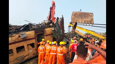 National Disaster Response Force (NDRF) personnel conduct rescue operation at the site of train crash in Vizianagaram district of Andhra Pradesh on October 30. (AFP) National Disaster Response Force (NDRF) personnel conduct rescue operation at the site of train crash in Vizianagaram district of Andhra Pradesh on October 30. (AFP)