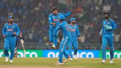 India's Kuldeep Yadav with teammates celebrates the wicket of England's Jos Buttler during the ICC Men's Cricket World Cup 2023 match (PTI)