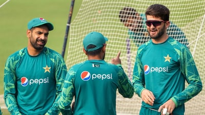 Pakistan's captain Babar Azam with teammates Haris Rauf and Shaheen Afridi during a practice session. (PTI) Pakistan's captain Babar Azam with teammates Haris Rauf and Shaheen Afridi during a practice session. (PTI)