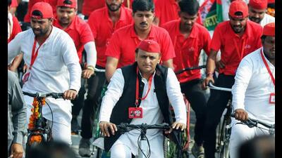 Samajwadi Party president Akhilesh Yadav, along with party workers, rides a bicycle during the party’s PDA yatra, in Lucknow on Monday. (ANI Photo) Samajwadi Party president Akhilesh Yadav, along with party workers, rides a bicycle during the party’s PDA yatra, in Lucknow on Monday. (ANI Photo)