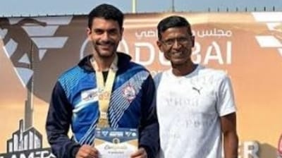 Angad Bedi poses with his gold medal.