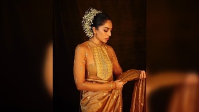 Sobhita Dhulipala elegantly pulled her hair into a bun and adorned it with delicate baby's breath flowers, enhancing her overall look with a touch of grace. (Instagram/@sobhitad) Sobhita Dhulipala elegantly pulled her hair into a bun and adorned it with delicate baby's breath flowers, enhancing her overall look with a touch of grace. (Instagram/@sobhitad)
