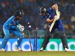 Jos Buttler is bowled out by Kuldeep Yadav