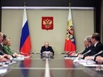 Russia's President Vladimir Putin (C) chairs a meeting with members of Security Council, Russian government and law enforcement agencies in Moscow.