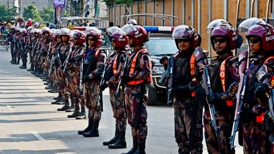 Border Guard Bangladesh (BGB) personnel stand guard during a nationwide strike called by Bangladesh Nationalist Party and Jamaat-e-Islami in Dhaka on October 29. (AFP) Border Guard Bangladesh (BGB) personnel stand guard during a nationwide strike called by Bangladesh Nationalist Party and Jamaat-e-Islami in Dhaka on October 29. (AFP)