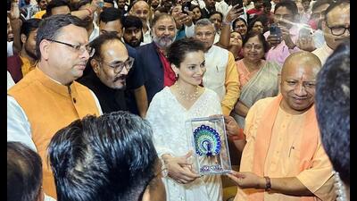 Bollywood actress Kangana Ranaut being felicitated by Uttar Pradesh chief minister Yogi Adityanath during the special screening of her film ‘Tejas’, in Lucknow on Tuesday. (ANI Photo)