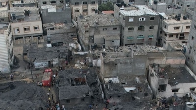 The rubble of destroyed buildings in a residential area targeted by Israeli missiles in Deir al-Balah, central Gaza. (Bloomberg) The rubble of destroyed buildings in a residential area targeted by Israeli missiles in Deir al-Balah, central Gaza. (Bloomberg)