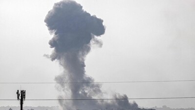 A smoke plume rising during Israeli bombardment. (AFP) A smoke plume rising during Israeli bombardment. (AFP)