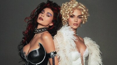 Kylie Jenner and Kendall Jenner dressed up Spice and Sugar from Batman for the Halloween this year. Kylie wore a black monokini with dramatic eye makeup, gloves and a wig. Kendall dressed up in white to play Sugar. She also sported a blonde wig. Kylie Jenner and Kendall Jenner dressed up Spice and Sugar from Batman for the Halloween this year. Kylie wore a black monokini with dramatic eye makeup, gloves and a wig. Kendall dressed up in white to play Sugar. She also sported a blonde wig. 