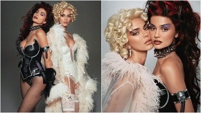 Kendall Jenner and Kylie Jenner dressed up as Sugar and Spice for Halloween, inspired by the Batman Forever movie. While Kylie wore a plunge-neck black bodysuit with sheer tights, a choker, and maroon highlights on wild curly locks, Kendall wore a feather-adorned sheer cape, white corseted bodysuit, and lace stockings. (Instagram) Kendall Jenner and Kylie Jenner dressed up as Sugar and Spice for Halloween, inspired by the Batman Forever movie. While Kylie wore a plunge-neck black bodysuit with sheer tights, a choker, and maroon highlights on wild curly locks, Kendall wore a feather-adorned sheer cape, white corseted bodysuit, and lace stockings. (Instagram)
