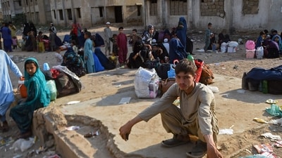 Afghan refugees wait at the Karachi bus terminal to depart for Afghanistan, in Sindh province. (AFP) Afghan refugees wait at the Karachi bus terminal to depart for Afghanistan, in Sindh province. (AFP)
