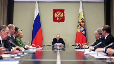 Russia's President Vladimir Putin (C) chairs a meeting with members of Security Council, Russian government and law enforcement agencies in Moscow. (AFP)