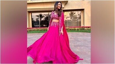 Rakul styled the ensemble with feathered brows, muted eye shadow, mascara on the lashes, rouge on the cheeks, glossy berry-toned lip shade, and centre-parted open wavy tresses. (Instagram) Rakul styled the ensemble with feathered brows, muted eye shadow, mascara on the lashes, rouge on the cheeks, glossy berry-toned lip shade, and centre-parted open wavy tresses. (Instagram)