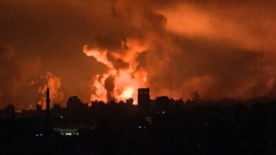 Footage shows balls of fire and smoke rising above Gaza City during an Israeli strike (AFP) Footage shows balls of fire and smoke rising above Gaza City during an Israeli strike (AFP)