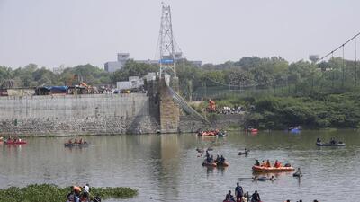 The pedestrian bridge collapsed in Morbi on October 30, 2022. (AP) The pedestrian bridge collapsed in Morbi on October 30, 2022. (AP)