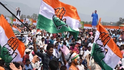 Congress supporters with Congress flags ahead of a rally. (File) Congress supporters with Congress flags ahead of a rally. (File)