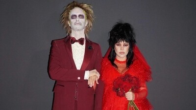 Beetlejuice and Lydia Deetz pose in the most romantic manner possible as they dress up for Halloween. They are expecting their first child together. Beetlejuice and Lydia Deetz pose in the most romantic manner possible as they dress up for Halloween. They are expecting their first child together.