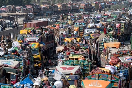 Afghan refugees arrive in trucks from Pakistan at the Afghanistan-Pakistan Torkham border in Nangarhar province on October 30, 2023. (AFP) Afghan refugees arrive in trucks from Pakistan at the Afghanistan-Pakistan Torkham border in Nangarhar province on October 30, 2023. (AFP)