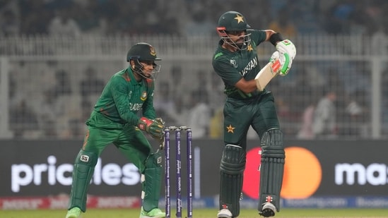 Babar Azam plays a shot during the ICC Men's Cricket World Cup match between Bangladesh and Pakistan (AP)