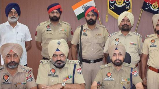 Ludhiana Police also recovered an illegal pistol and three bullets from the truck at Drain Bridge in Abupura village during special checking. (HT Photo)