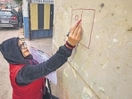 An enumerator staff marks a house during the first phase of the caste-based census in Bihar, in Patna, January 7, 2023 (PTI)