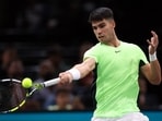 Spain's Carlos Alcaraz in action during his round of 32 match against Russia's Roman Safiullin