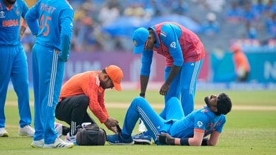Hardik Pandya receives medical treatment after being injured during the ICC Men's Cricket World Cup match between India and Bangladesh (AP) Hardik Pandya receives medical treatment after being injured during the ICC Men's Cricket World Cup match between India and Bangladesh (AP)