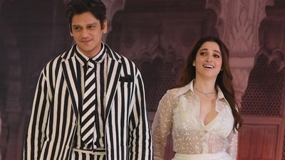 Tamannaah Bhatia was a vision of beauty in her elegant white sheer dress, while Vijay Varma exuded sophistication in a black and white striped suit. (AFP) Tamannaah Bhatia was a vision of beauty in her elegant white sheer dress, while Vijay Varma exuded sophistication in a black and white striped suit. (AFP)