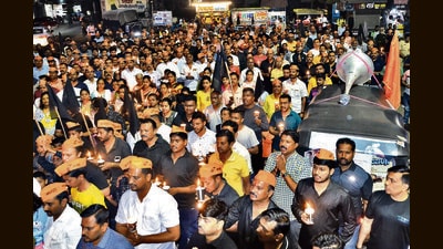 Local Maratha community members participate in candle march to protest against the state demand reservations. (UDAY DEOLEKAR)