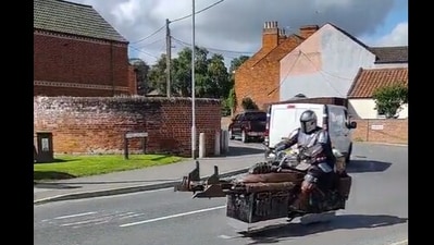Snapshot of the man 'flying' his bike. (X)