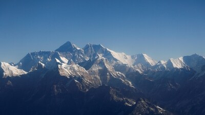Mount Everest, the world highest peak, and other peaks of the Himalayan range are seen through an aircraft window during a mountain flight from Kathmandu, Nepal (REUTERS/Monika Deupala//File Photo)